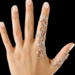Make a bold statement with the Vintage Double Finger Chain Link Ring , a stunning fusion of vintage charm and modern elegance. This exquisite piece features a delicate chain link design adorned with sparkling rhinestones, creating an intricate floral motif that captures attention from every angle. Designed to be worn across two fingers, this ring adds a touch of sophistication and flair to any outfit, making it perfect for parties, special occasions, or even as a standout accessory for everyday wear. Its adjustable fit ensures comfort for both women and girls, while the timeless design makes it a versatile addition to any jewelry collection.